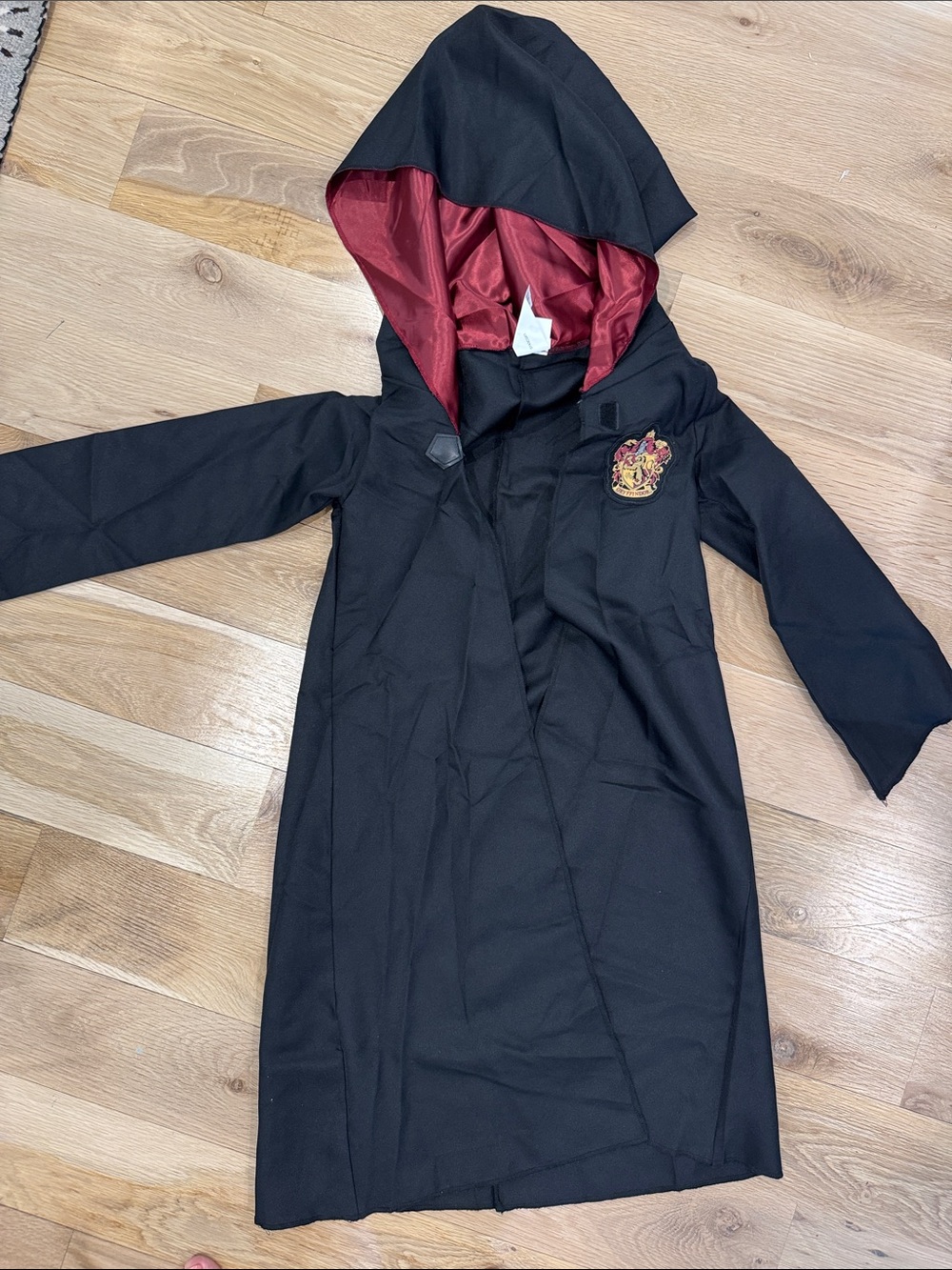 Harry Potter Kids Black Hooded Costume Robe with Red Lining and Gryffindor Crest